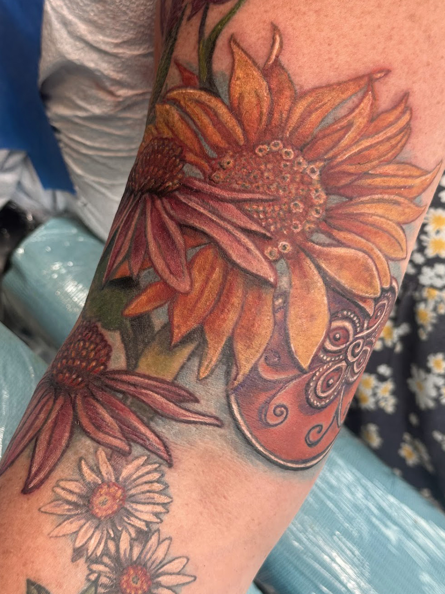 Mid-size tattoo by Michele Aitchison